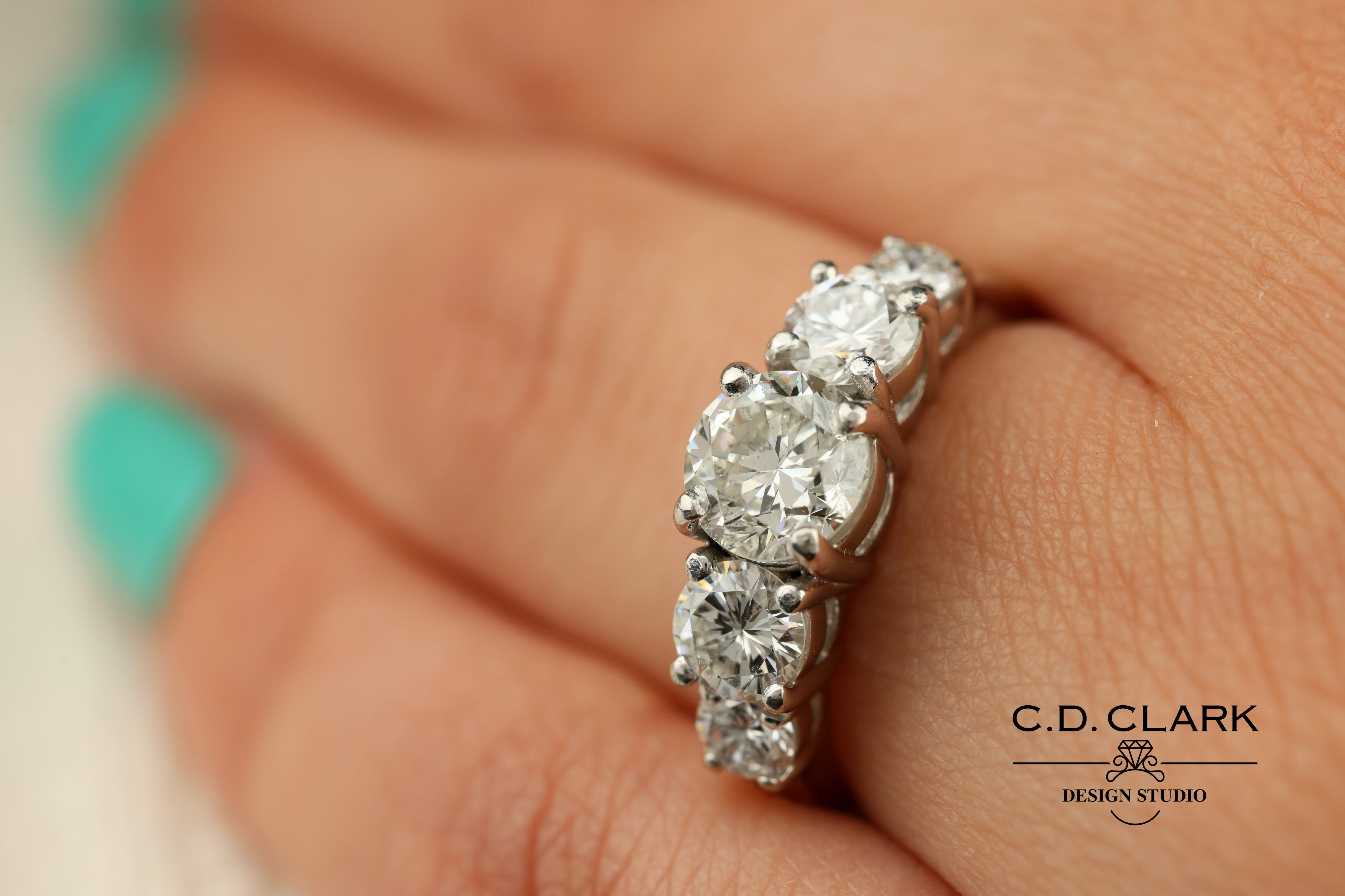 Platinum five stone anniversary band