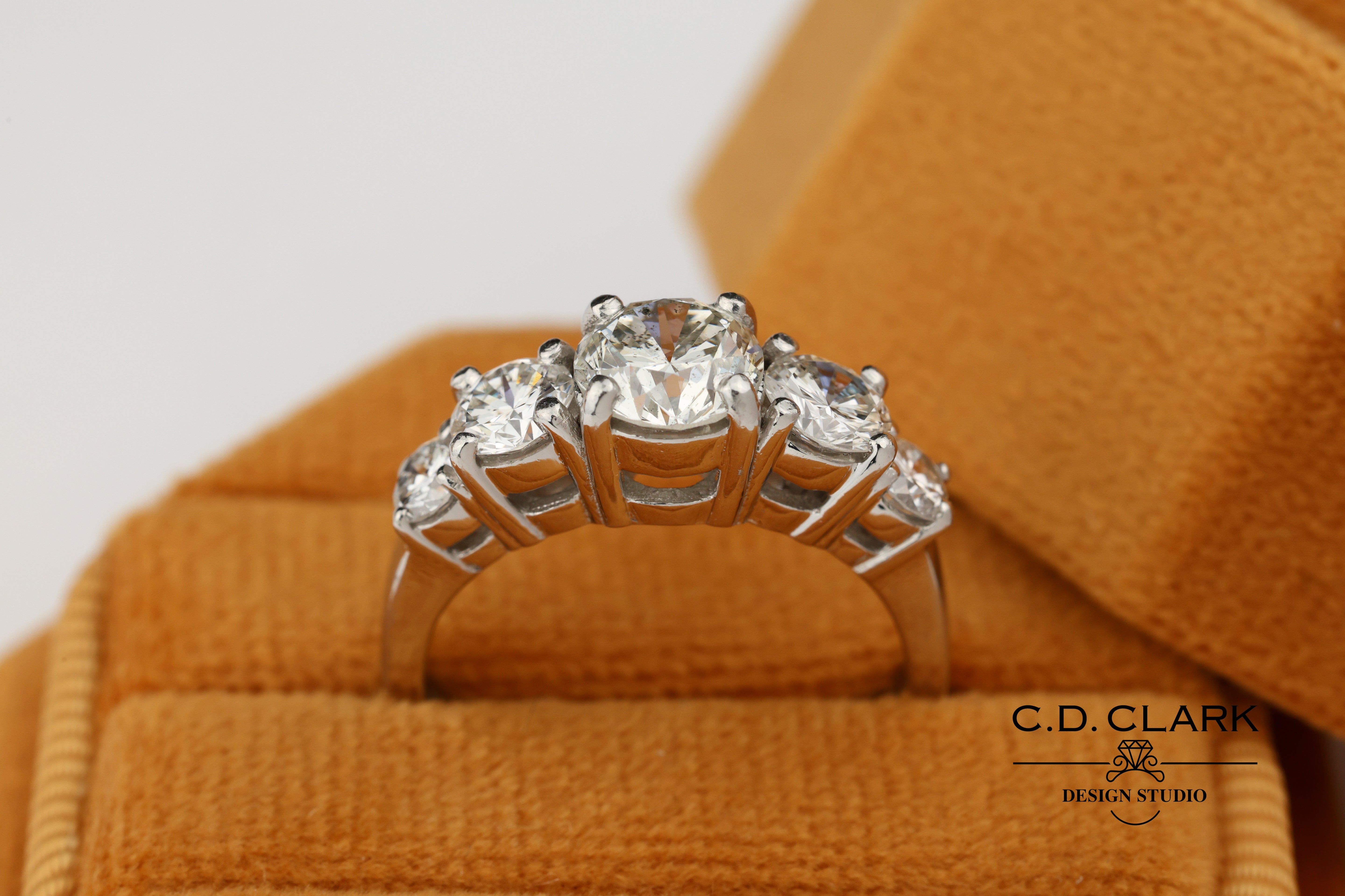 Platinum five stone anniversary band