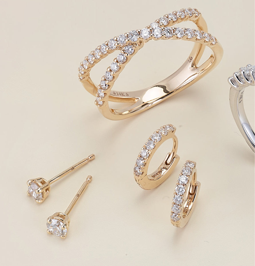 Infinity Criss-Cross Diamond Ring with diamond stud and huggie earrings