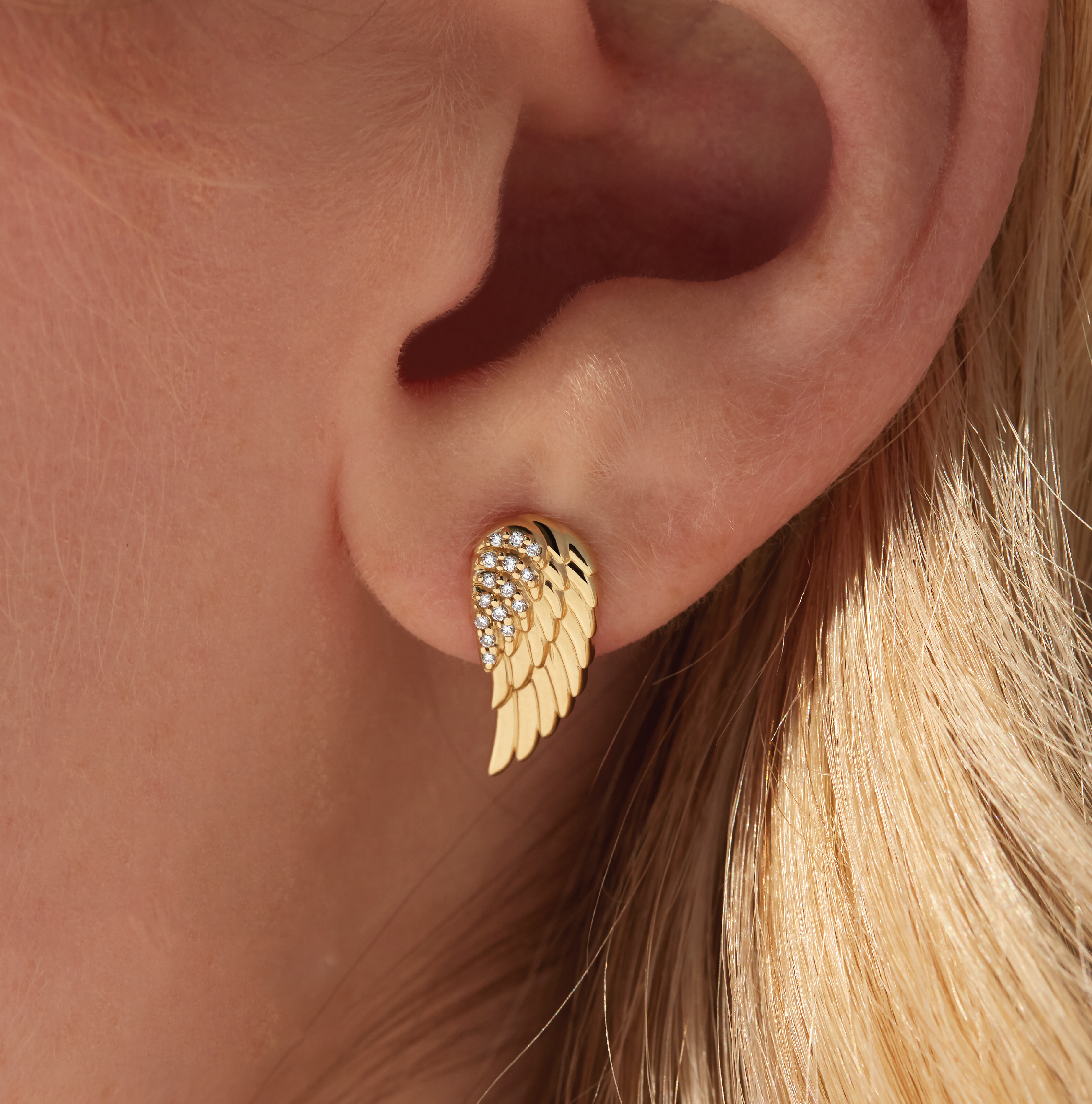 woman wearing Natural Diamond Angel Wing Earrings