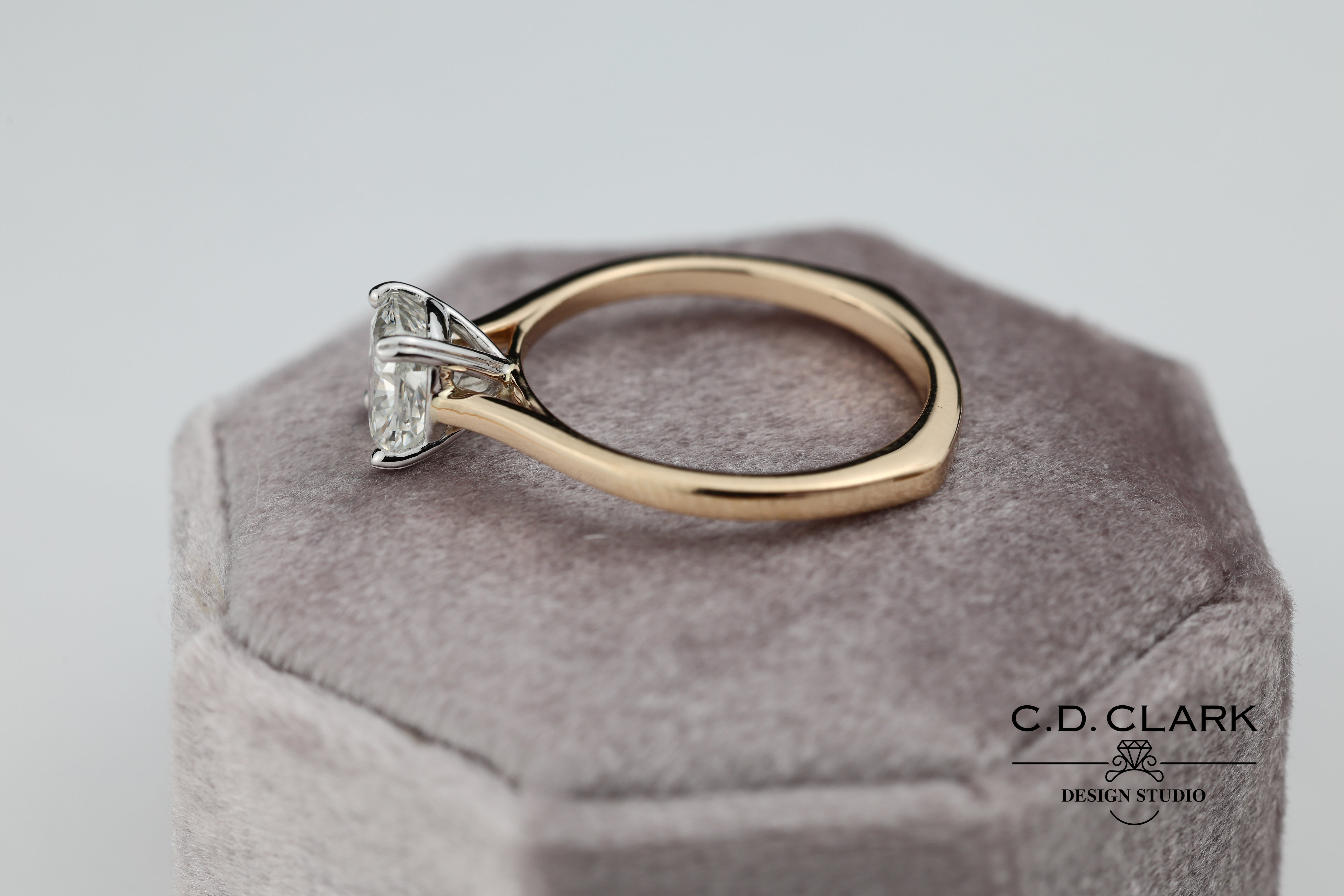 Shimmering brilliance awaits in this stunning 14kt Gold Band, featuring a dazzling 1.55 ct Cushion