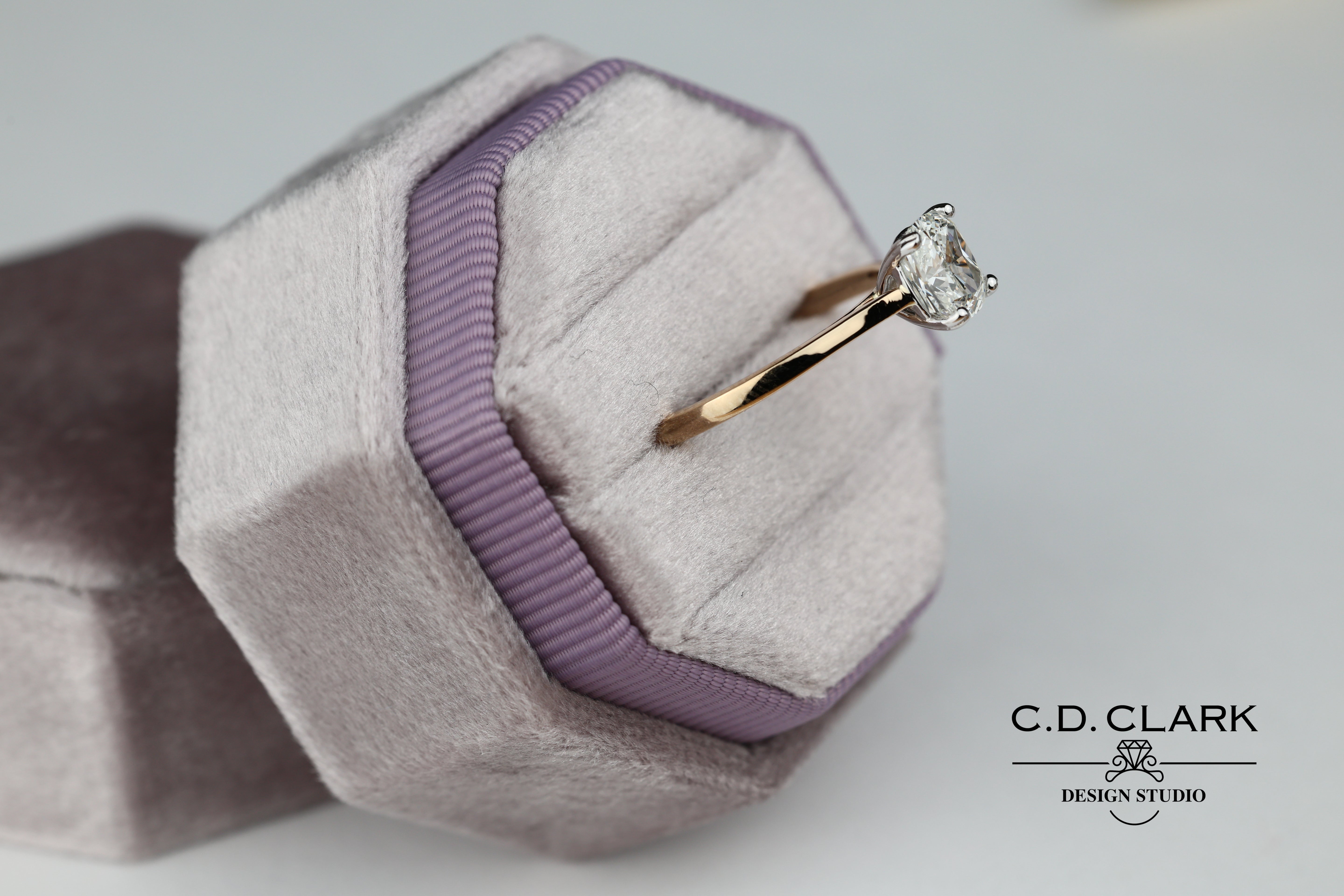 Shimmering brilliance awaits in this stunning 14kt Gold Band, featuring a dazzling 1.55 ct Cushion