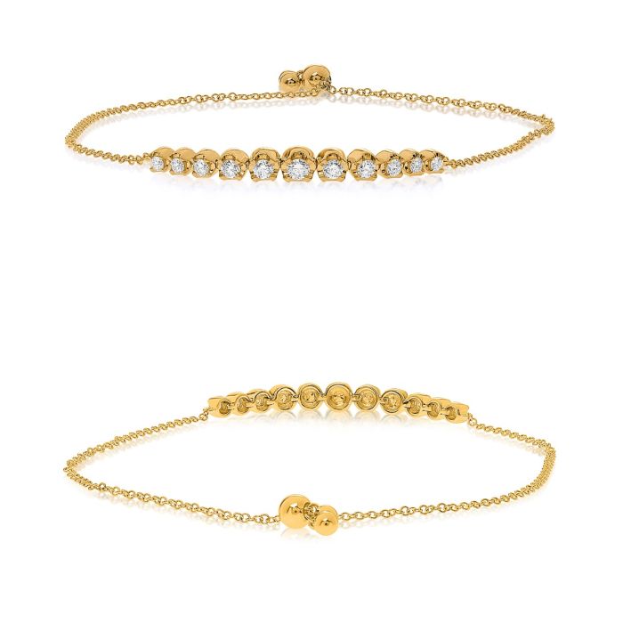 Yellow gold bangle adorned with .39 carat diamonds, radiating elegance