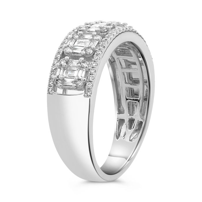 White gold ring adorned with baguette and round diamonds, side view