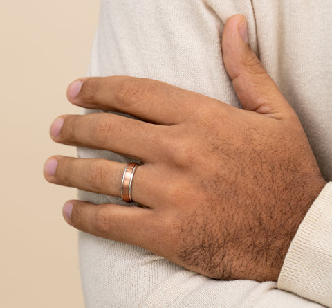 man wearing Platinum/14K Rose wedding band for man