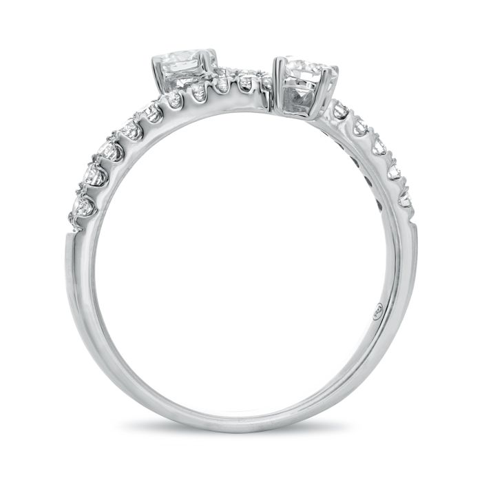 14K White Gold Bypass Diamond Radiance Ring: Sophisticated with a touch of charm. Crafted from high-quality white gold, featuring round-cut diamonds for brilliance, side view