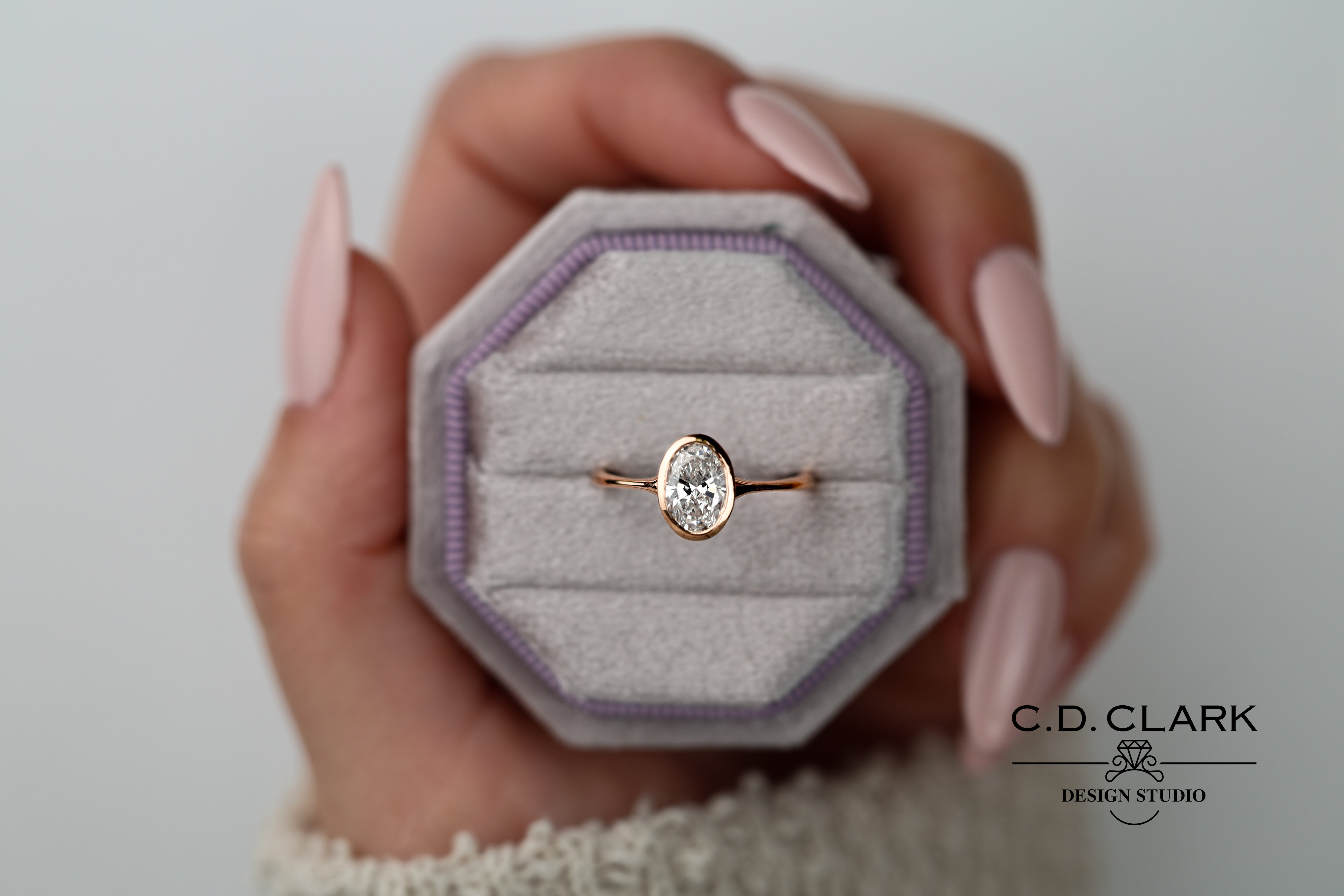 The Aria Oval Rose Gold Bezel Set Engagement Ring