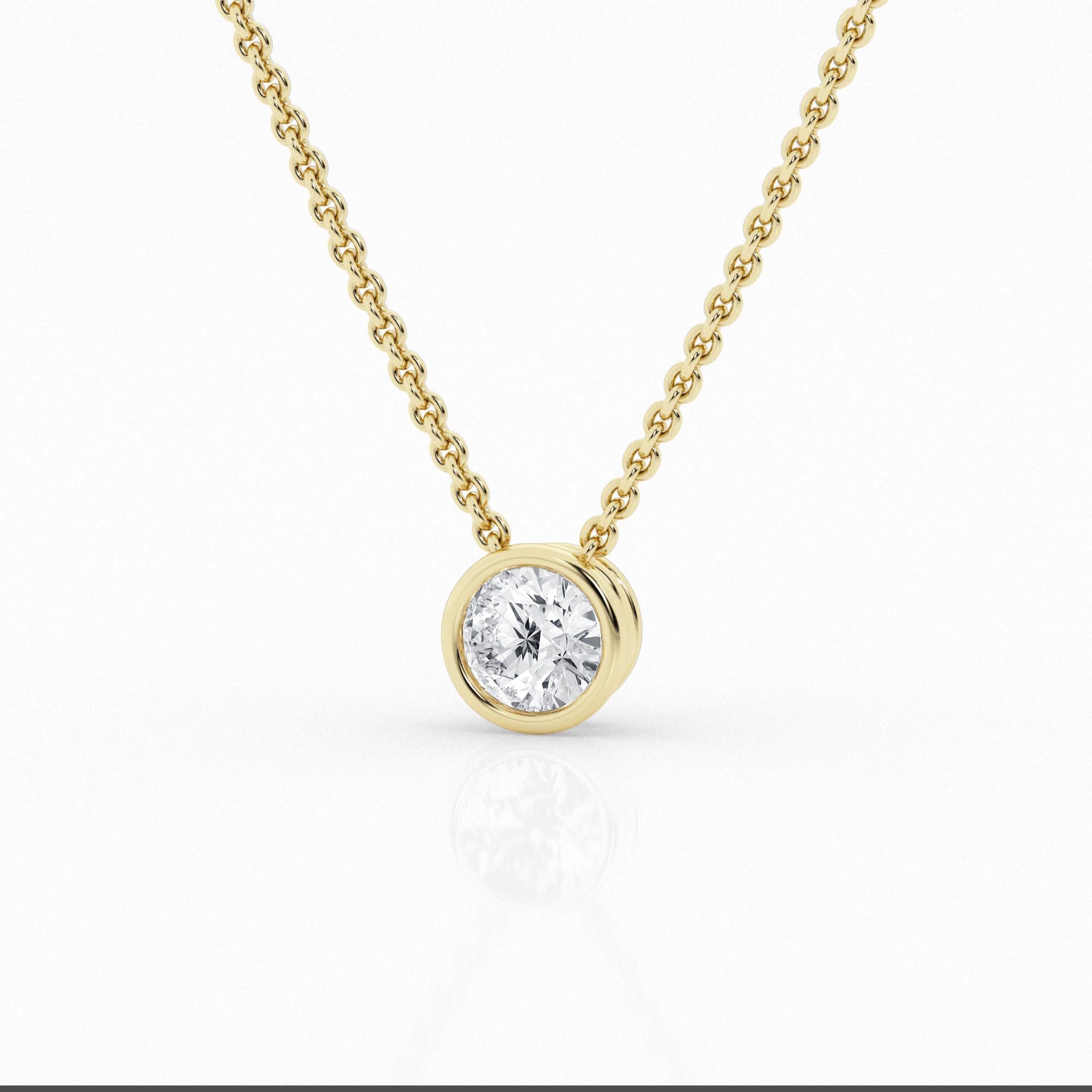 ellow gold bezel pendant featuring a 0.5 carat lab-grown diamond, front view