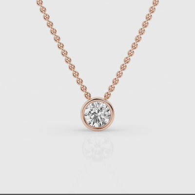 video of Rose gold bezel pendant showcasing a 0.5 carat lab-grown diamond